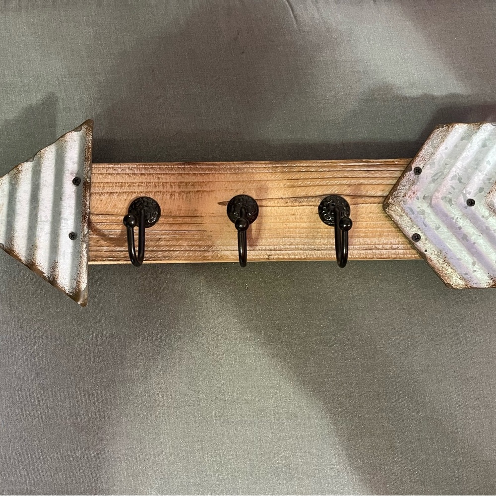 Wall hanger/clothes or coat hanger